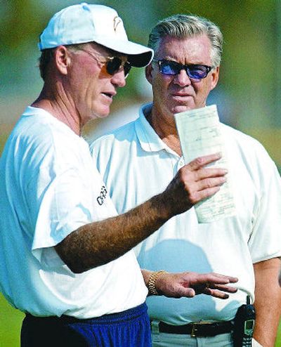 
Former San Diego coach Marty Schottenheimer, left, and general manager A.J. Smith too often had trouble seeing eye to eye. 
 (Associated Press / The Spokesman-Review)