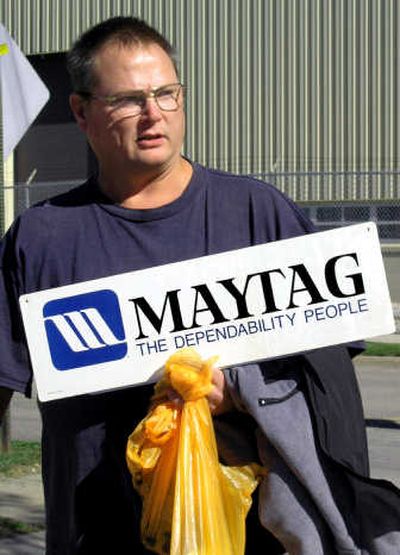 
Mark Wickliff, 49, leaves the Maytag appliance factory in Newton, Iowa, on its last day of production. The plant is being closed by Whirlpool Corp., which bought Maytag last year. Wickliff says he's part of the crew that will work a few more weeks to shut down the plant. He'll then have to look for a job after 26 years of working for Maytag. Associated Press
 (Associated Press / The Spokesman-Review)