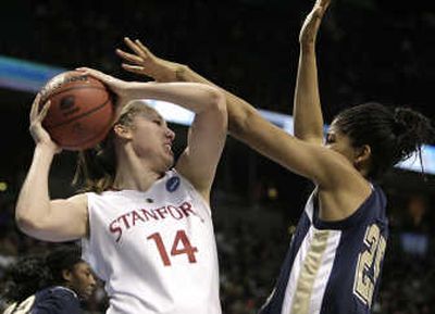 
Stanford's Kayla Pedersen snares a rebound against Pittsburgh's Shayla Scott during Saturday's first half at the Arena. 
 (Tyler Tjomsland / The Spokesman-Review)