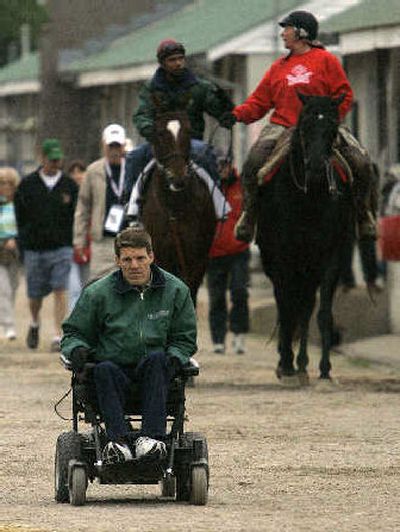 
Trainer Dan Hendricks, front, pins hopes on Brother Derek, left.
 (Associated Press / The Spokesman-Review)