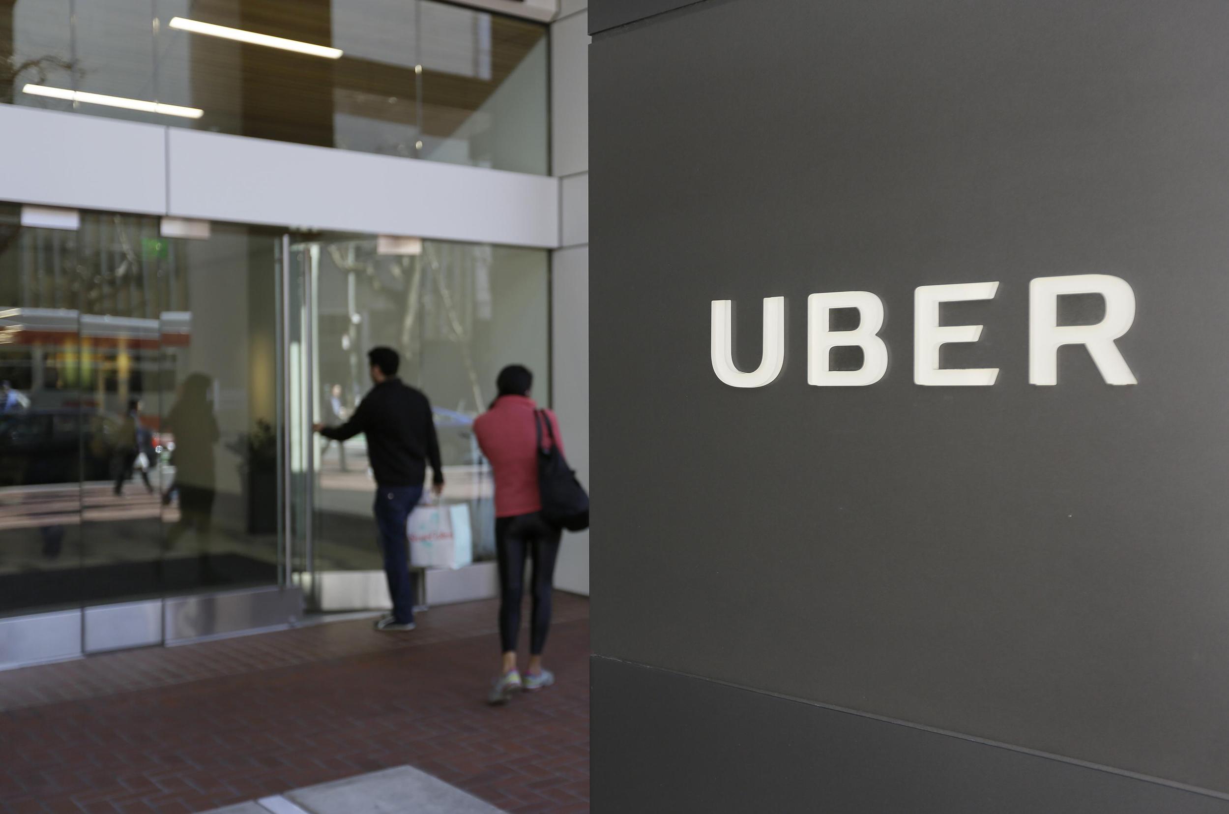 Seattle may set minimum base fare for ride-shares Uber, Lyft