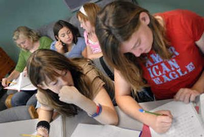 Salk Middle School students, from left, Chelsea Bennett, Ari McGarry, Becca Norman, Michaela Lindley and Amanda Lunnen study math Friday morning at Prince of Peace Lutheran Church before classes at school.
(Photos by Brian Plonka / The Spokesman-Review)