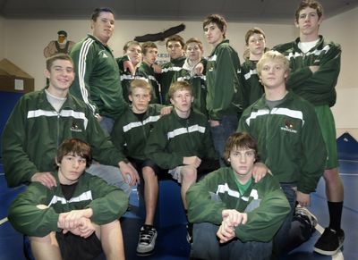 There are seven sets of brothers wrestling for Lakeside High School this year. In the middle are Josh and Jacob Lauderdale. Clockwise from bottom left are Mike and Kyan Martin, Joel and Alex Lazott, Chase and Ben Fuson, Mike and Bryan Baumgarden, Josh and Jacob Judd, and Tim and Patric Irish.  (Christopher Anderson / The Spokesman-Review)