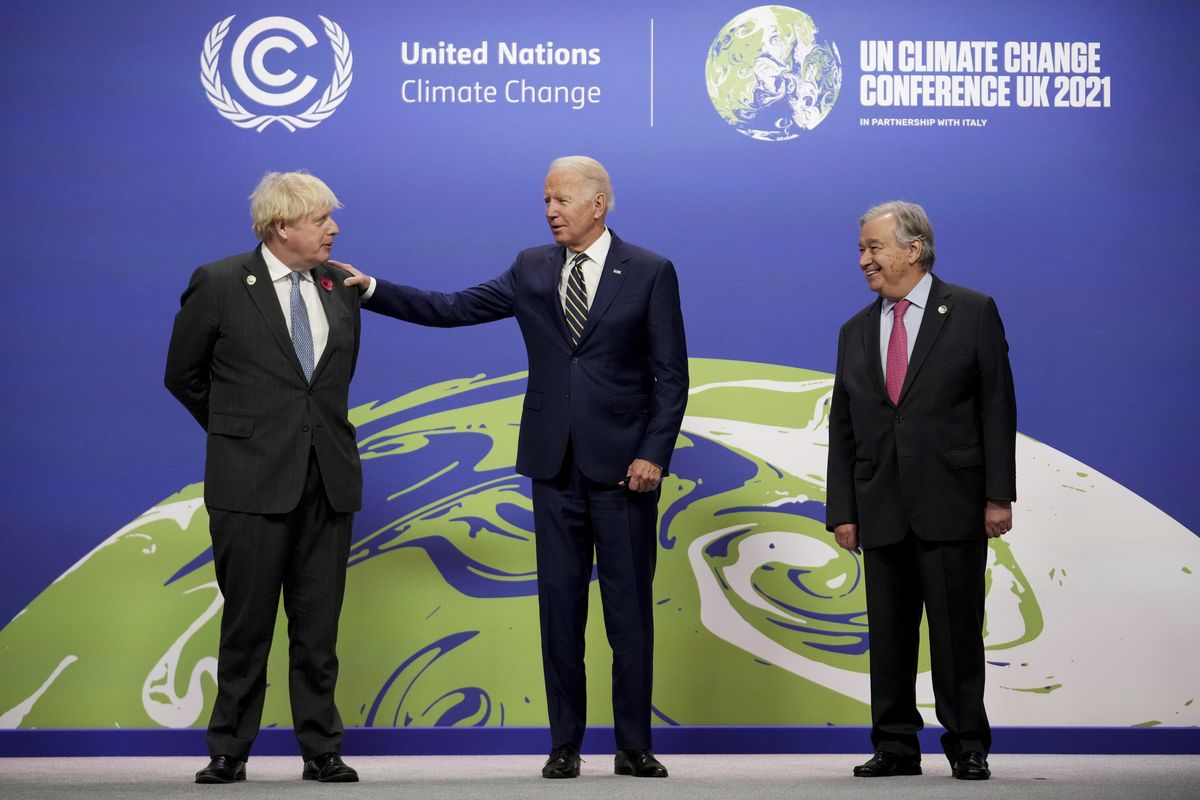 British Prime Minister Boris Johnson, left, and UN Secretary-General Antonio Guterres, right, greet U.S. President Joe Biden , at the COP26 U.N. Climate Summit in Glasgow, Scotland, Monday, Nov. 1, 2021. The U.N. climate summit in Glasgow gathers leaders from around the world, in Scotland