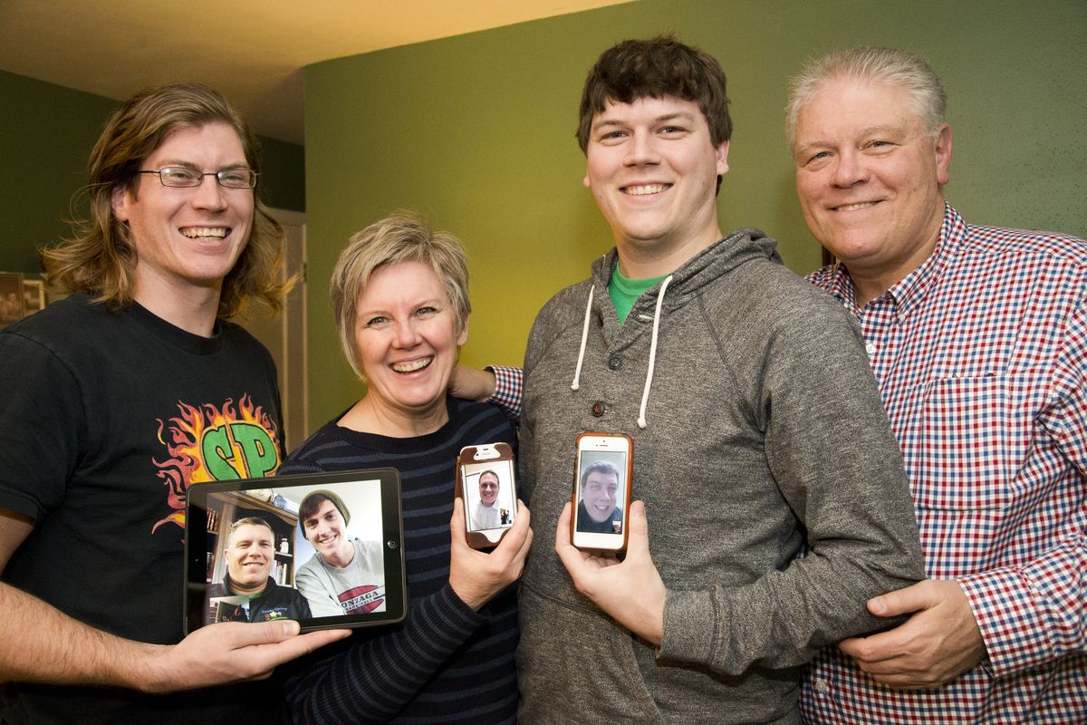 The Glanzer family comprises, in person from left, Joseph, Donna, Isaac and Keith, plus the other four sons shown via computer and phone connections, from left, Ezra, Peter, Samuel and Paul. All six sons are Eagle Scouts. (Jesse Tinsley)