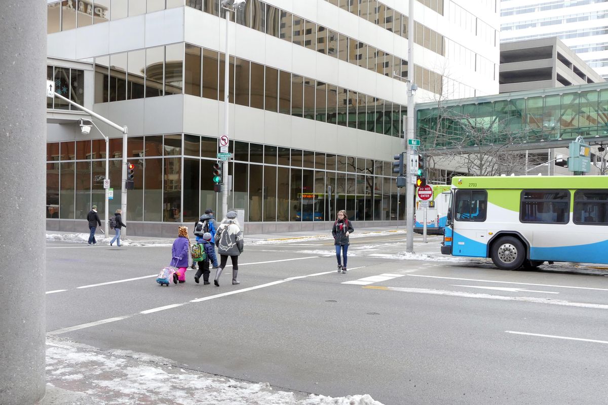 2017 - The corner of Riverside Avenue and Wall Street is home to the modern Bank of American Financial Center, left, and the Spokane Transit Authority bus plaza at right, shown Sunday, Dec. 31, 2017. But from the 1940s to the 1970s, it was home to two popular upscale women’s clothing stores, Bernards and Zukor’s. (Jesse Tinsley / The Spokesman-Review)