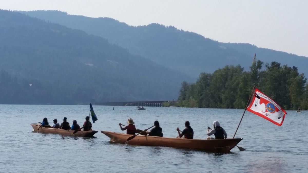 Dugout canoes set out from Sandpoint City Beach on Aug. 3, 2017. (Helen Yost/Courtesy photo)