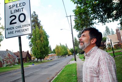 Neighborhood activist John Covert, shown near Wilson Elementary School, spearheaded the campaign to use curb extensions to save trees along Lincoln Street.  (Jesse Tinsley / The Spokesman-Review)