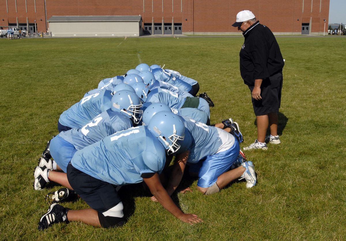 Central Valley offensive line coach Sam Giampetri has a huge task in building an offensive line with only one returning veteran, center Colby Davis.  (J. BART RAYNIAK / The Spokesman-Review)