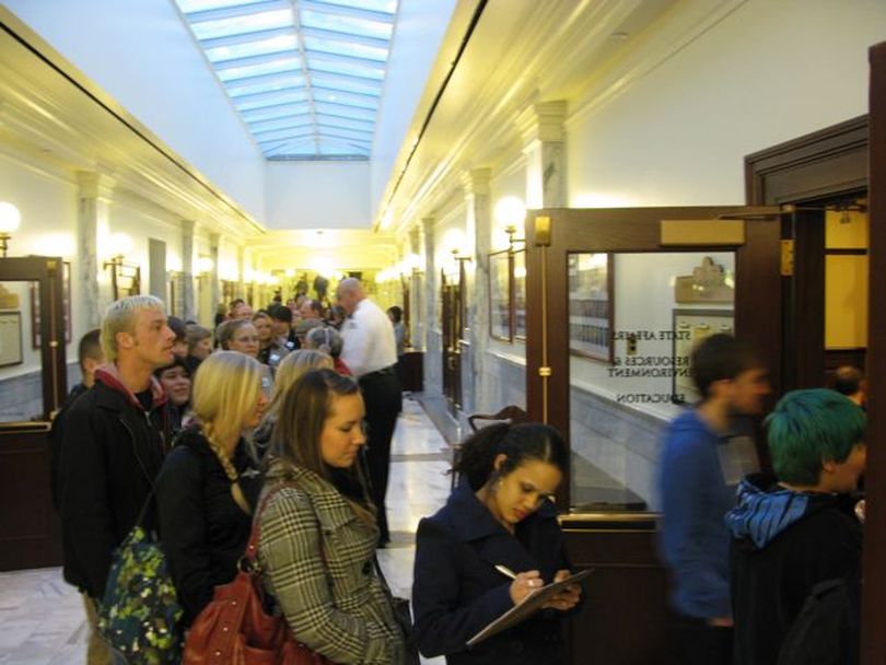 Crowd lines up for print hearing Friday morning on 
