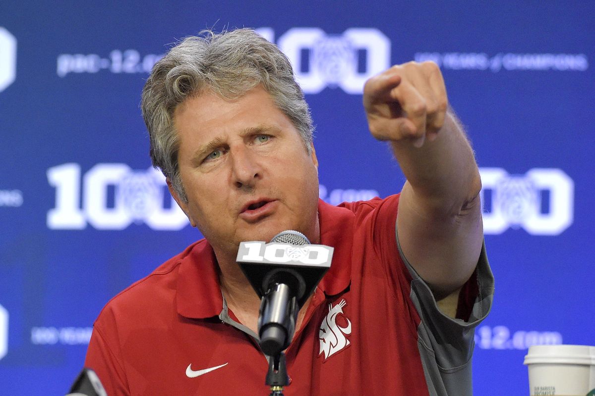 Washington State head coach Mike Leach speaks to reporters during  Pac-12 Football Media Days in  2015, in Burbank, Calif. (Mark J. Terrill / AP)