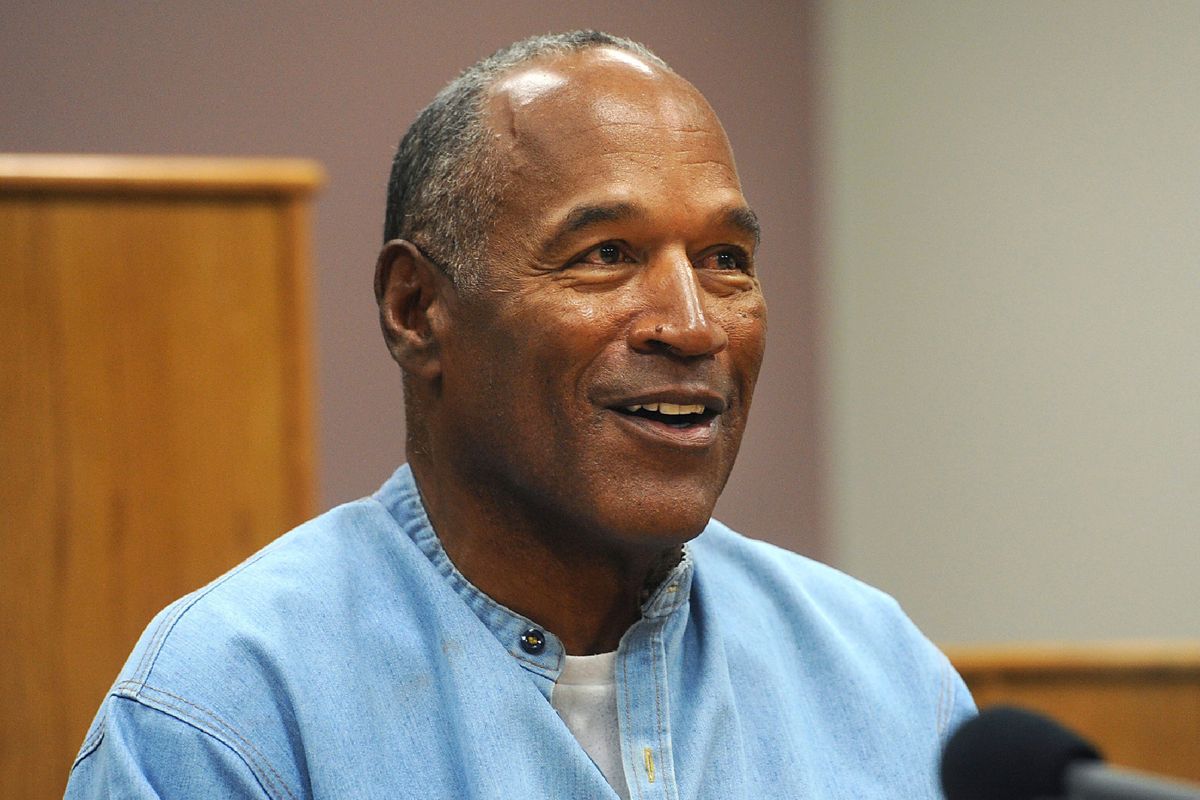 FILE - In this July 20, 2017, file photo, former NFL football star O.J. Simpson appears via video for his parole hearing at the Lovelock Correctional Center in Lovelock, Nev. The 74-year-old former football hero, acquitted California murder defendant and convicted Las Vegas armed robber was granted good behavior credits and discharged from parole effective Dec. 1, the day after a hearing before the Nevada state Board of Parole, Kim Yoko Smith, spokeswoman for the Nevada State Police, said Tuesday, Dec. 14, 2021.  (Jason Bean)