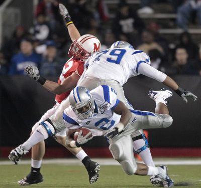 MTSU running back Benjamin Cunningham scampers for yardage.  (Associated Press)