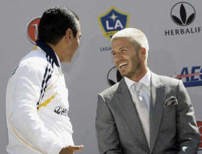 
David Beckham, right, laughs it up with Los Angeles Mayor Antonio Villaraigosa on Friday at Carson, Calif.  Associated Press
 (Associated Press / The Spokesman-Review)