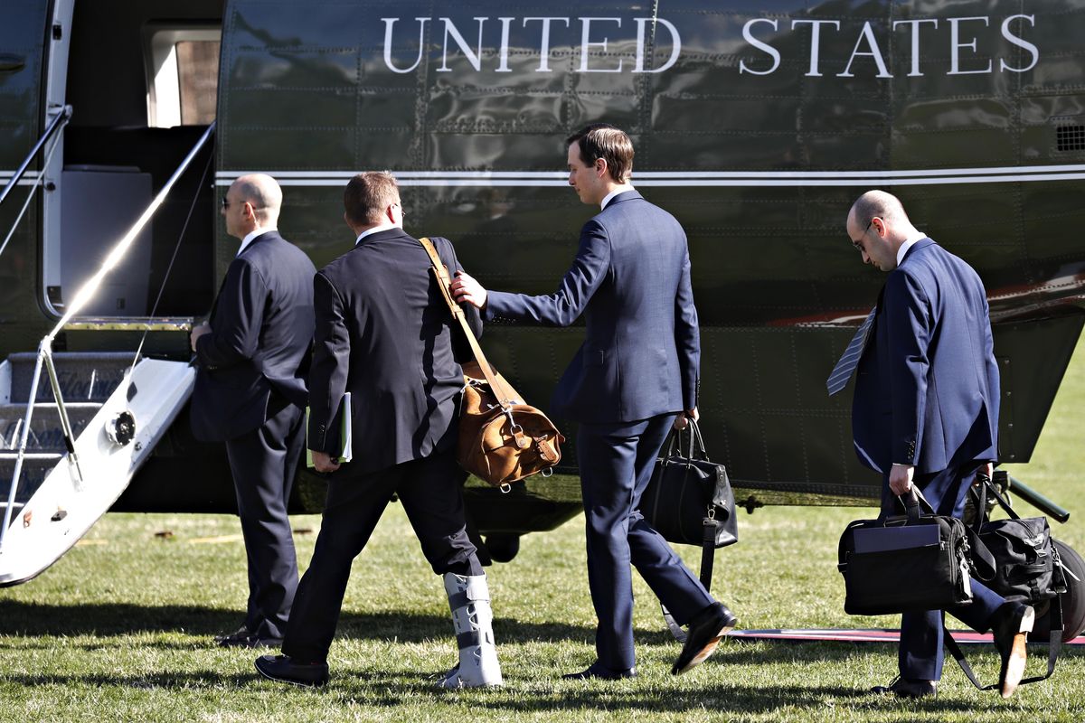 White House acting Chief of Staff Mick Mulvaney, left, walks with White House senior adviser Jared Kushner, and White House senior adviser Stephen Miller, to board the Marine One helicopter on the South Lawn of the White House, Thursday March 28, 2019, in Washington, to travel with President Donald Trump en route to Michigan, where Trump was slated to speak at a rally in Michigan before spending the weekend at his Mar-a-Lago estate in Florida. (Jacquelyn Martin / AP)