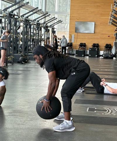 Elisha Cummings warms up with a medicine ball during a recent workout at the University of Idaho.  (Peter Harriman/The Spokesman-Review)