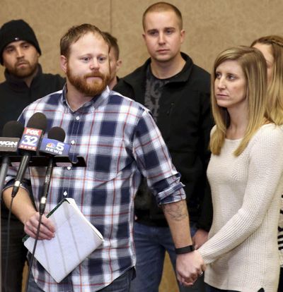 Family spokesman David Boyd and others hold a news conference Thursday, Jan. 5, 2017, in Crystal Lake, Ill., after an 18-year-old man was assaulted in Chicago earlier this week. Four people were charged with hate crimes Thursday in connection with a video broadcast live on Facebook that showed a mentally disabled white man being beaten and taunted, threatened with a knife and forced to drink from a toilet. Boyd is the brother-in-law of the victim. (Patrick Kunzer / AP)