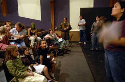 The Spokesman-Review Director Selma Rhodes, right, gives instructions to the cast and crew of