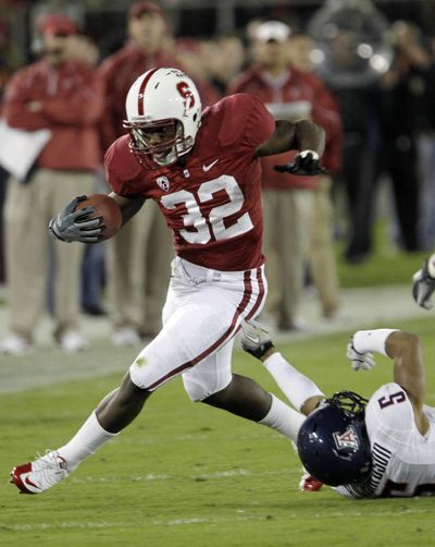 Stanford RB Anthony Wilkerson evades a tackle on Saturday. (Associated Press)