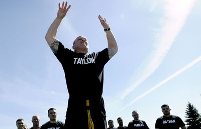 Rathdrum police Officer Chris Taylor takes his turn at the POST Academy jump test during physicals at Lake City High School in Coeur d’Alene on Monday as part of a new program available through NIC.  North Idaho officers previously had to travel to Meridian to complete the required course.  (Kathy Plonka / The Spokesman-Review)