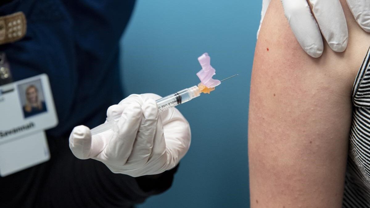 An incoming sixth-grader gets immunizations at Rockwood Pediatrics on July 15. New rules for immunizations for Spokane Schools students include medical verification of all shots and the extension of the Tdap vaccine through high school. (Jesse Tinsley/The Spokesman-Review)