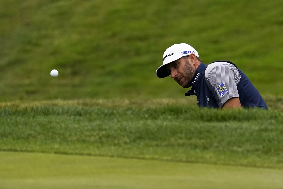 Dustin Johnson hits from the bunker on the eighth hole during the final round of the PGA Championship golf tournament at TPC Harding Park Sunday, Aug. 9, 2020, in San Francisco. (Jeff Chiu)