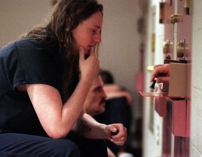 Inmate Casey Beckham (left) plays chess through a locked cell door with Jay Merrill. Crowding has forced a cutback in free time for some areas allowing only 3 hours a day out of the cell. Dan Pelle Photo (Dan Pelle / The Spokesman-Review)