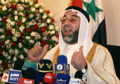 
Prominent Sunni cleric Ahmed Abdul Ghafour al-Samaraie offers the support of his Sunni Endowment to Iraqi Prime Minister Nouri al-Maliki's national reconciliation plan at a news conference Tuesday. 
 (Associated Press / The Spokesman-Review)