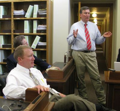 House Assistant Majority Leader Scott Bedke, R-Oakley, right, explains the House GOP leadership's plan to adjourn for the session on Wednesday without passing the governor's transportation plan - forcing the Senate or governor to call it back into session against its will. At left is House Majority Caucus Chairman Ken Roberts, R-Donnelly. (Betsy Russell / The Spokesman-Review)