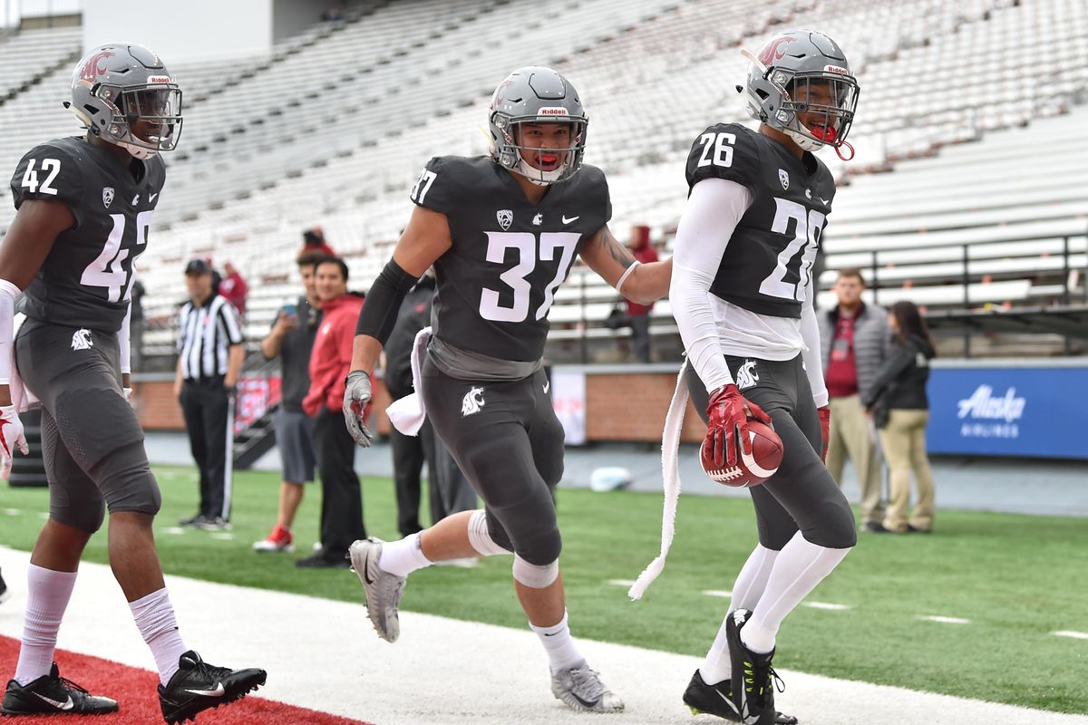 In this April 20, 2019 photo, WSU safety Bryce Beekman reacts after he intercepted a pass intended for wide receiver Davontavean Martin (1) on a play that was called back for pass interference during WSU