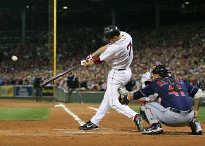 
Boston's J.D. Drew hits a grand slam off Cleveland pitcher Fausto Carmona in the first inning of ALCS Game 6.Associated Press
 (Associated Press / The Spokesman-Review)
