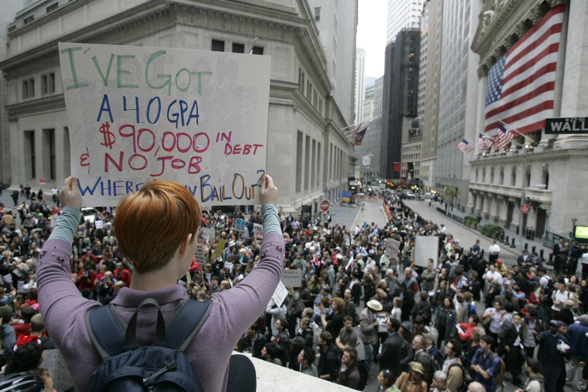 Associated Press Dara Blumenthal, of Brooklyn, N.Y., holds a sign during a Sept. 25, 2008, rally against Wall Street bailout in front of the New York Stock Exchange in New York. (File Associated Press / The Spokesman-Review)