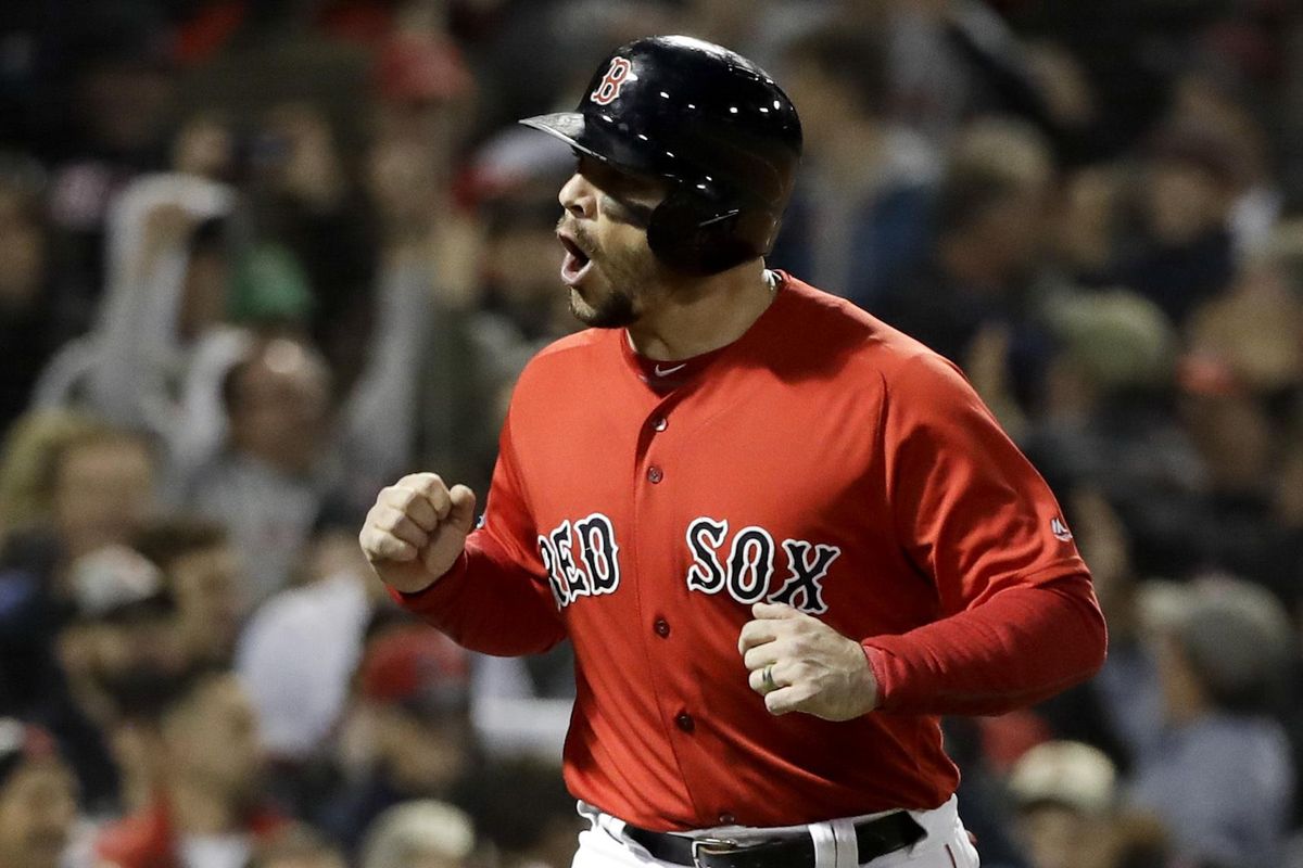 Boston Red Sox’s Steve Pearce celebrates after being walked in for a run during the fifth inning in Game 1 of a baseball American League Championship Series against the Houston Astros on Saturday, Oct. 13, 2018, in Boston. (David J. Phillip / Associated Press)