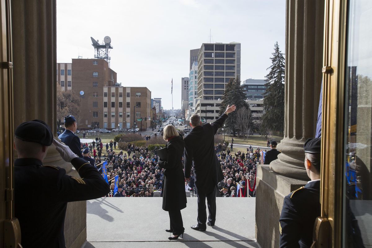 Idaho Gov.-elect Brad Little, with his wife Teresa Little, waves to the crowd after he is sworn in on the steps of the State Capitol building on Friday, Jan. 4, 2019 in Boise, Idaho. Under Idaho law, Little will officially become governor at a private ceremony Monday morning. (Otto Kitsinger / AP)