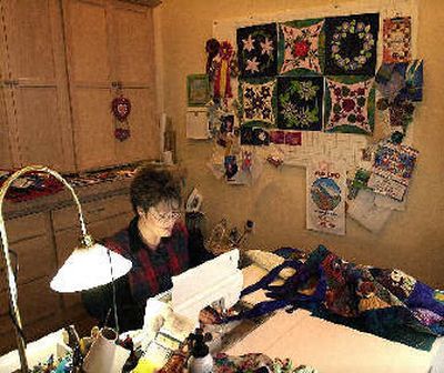 
Barbara Lambrecht works in the custom sewing room designed for her quilting needs.
 (The Spokesman-Review)