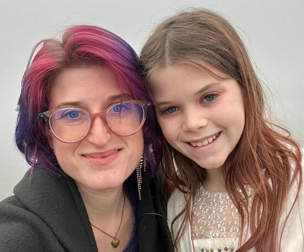 This photo shows Jillian Amodio and her 10-year-old daughter, Juliette, on Jan. 1, 2022, in Annapolis, Md. On social media, in classrooms and at the playground, children who hear about Russia