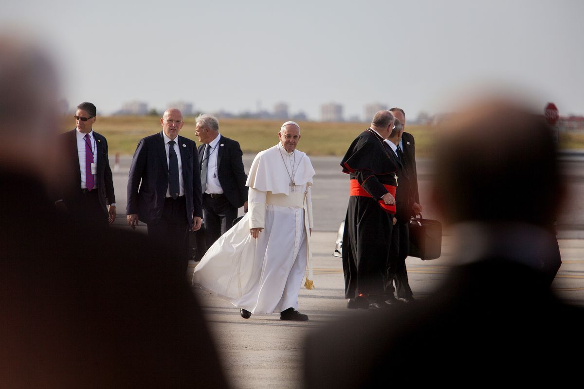 FILE -- Pope Francis walks to a plane at John F. Kennedy International Airport after a visit to New York, Sept. 26, 2015. Unlike his predecessor, Pope Leo XIV enjoys growing support from a broad swath of conservative Catholics. (Sam Hodgson/The New York Times)
