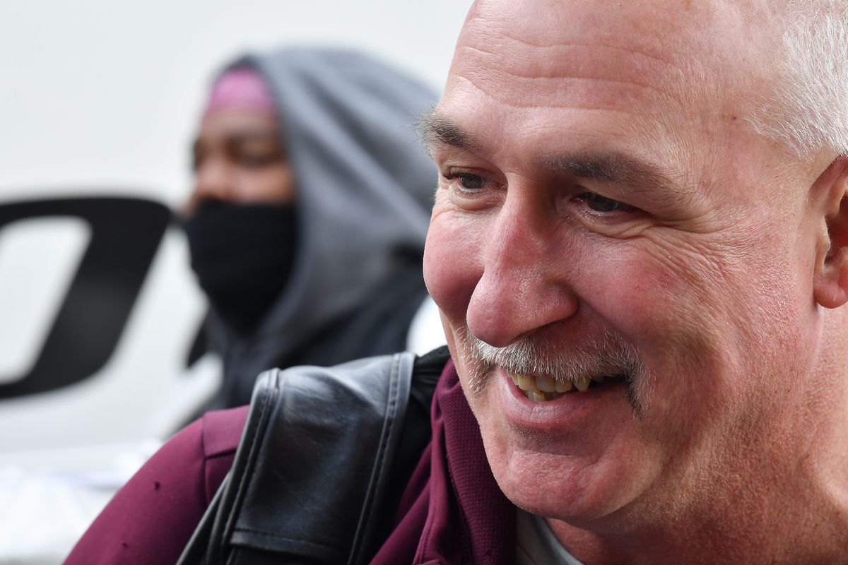 Robb Akey, a defensive coordinator at Central Michigan, smiles as his team arrives at their team hotel Thursday before the Sun Bowl in El Paso, Texas.  (Tyler Tjomsland/The Spokesman-Review)