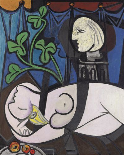 “Nude Green Leaves, and Bust,” a 1932 painting by Pablo Picasso, measures more than 5 feet by 4 feet and shows a reclining nude figure with an image of Picasso in the background looking over her.  (Associated Press)
