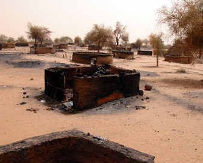 
A burned village in the Darfur region of Sudan is seen in this recent but undated photo released by the WFP in Rome on Wednesday.
 (Associated Press / The Spokesman-Review)