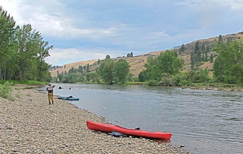 An angler prepares for go fishing during a paddling trip down the Kettle River in northeastern Washington.
Photo shows a section of the Kettle River -- just north (down river) from Curlew and a few miles south of the border Canada border at Danville -- where bait fishing would be allowed under a proposal being considered for 2012 Washington sportfishing regulations. 

 (Bob Whittaker)
