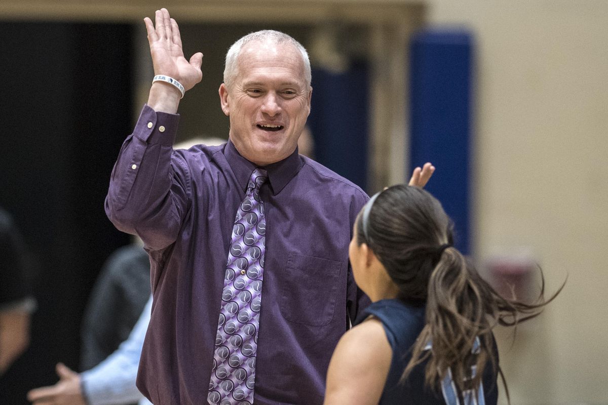 Central Valley girls basketball coach Freddie Rekhow greets Cameron Skaife before playing Mead on Dec. 5, 2017. CV and Mead both play in the inaugural Cam Jam Clash for Cancer at Central Valley HS this weekend. (Dan Pelle / The Spokesman-Review)