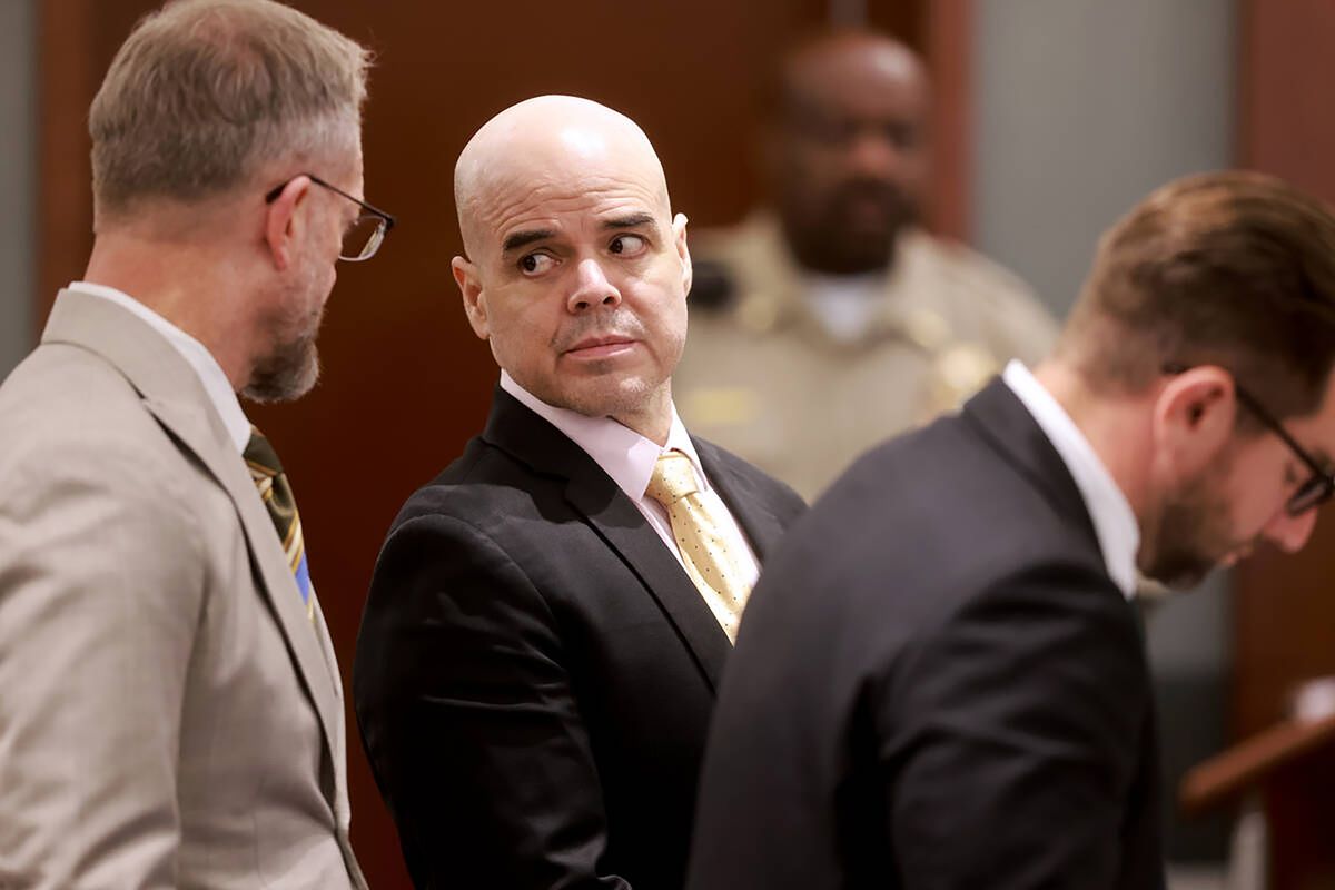 Robert Telles, center, is flanked by his attorneys Robert Draskovich, left, and Michael Horvath during his murder trial at the Regional Justice Center in Las Vegas Friday, Aug. 23, 2024. Telles, a former Clark County public administrator, is charged in the murder of Las Vegas Review-Journal investigative journalist Jeff German.   (K.M. Cannon/Las Vegas Review-Journal/TNS)