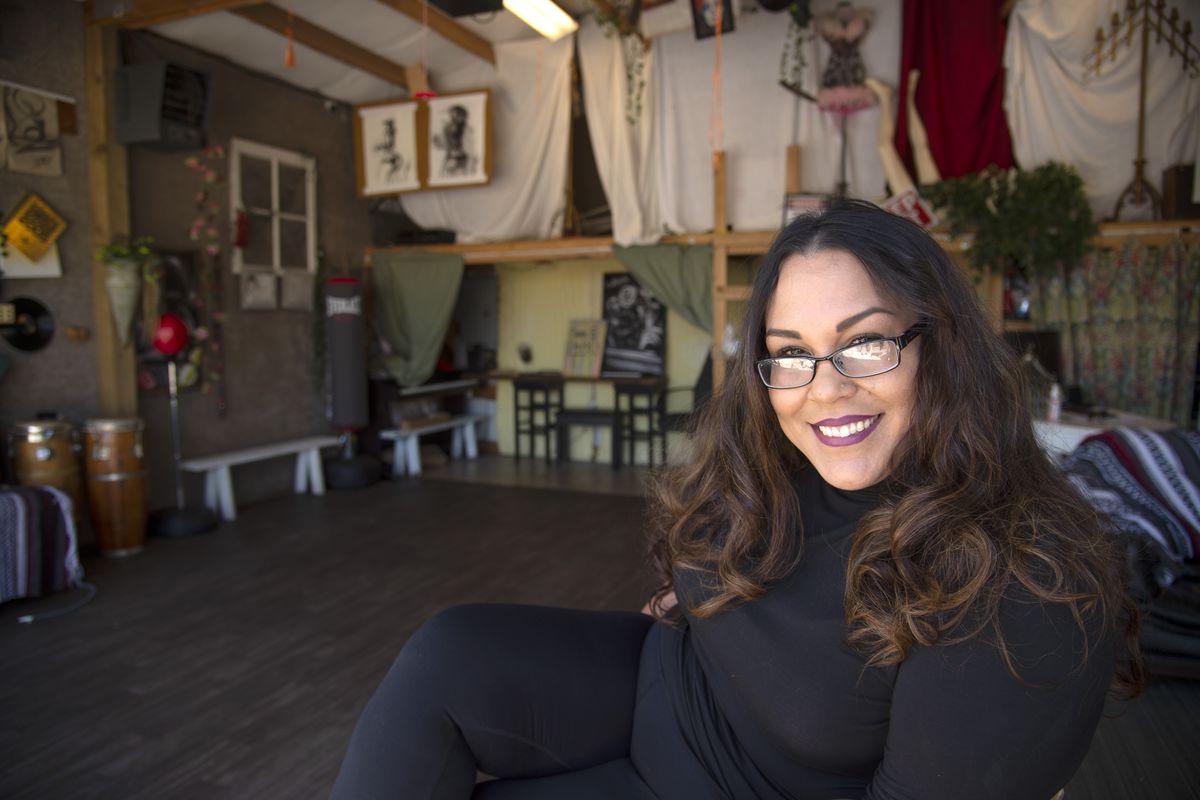 Natalia Gutierrez, founder of the nonprofit If You Could Save Just One, sits in their program space, an unused garage belonging to a local church, on Nevada Street in northwest Spokane, Friday, Aug. 14, 2020. The space will be used for after-school programs, like art, music and writing, for kids.  (Jesse Tinsley/THE SPOKESMAN-REVIEW)