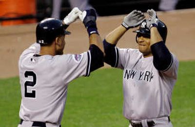 
New York's game against Baltimore at Yank-friendly Camden Yards, featured 9 HRs, including one by Bobby Abreu, right. Associated Press
 (Associated Press / The Spokesman-Review)