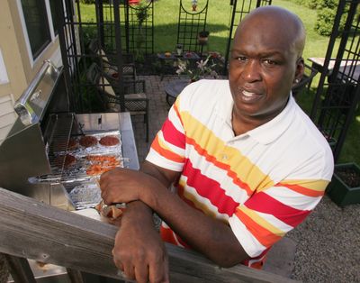 Buster Douglas, with relationships mended and a cookbook to his credit, rests in the Ohio residence.  (Associated Press / The Spokesman-Review)