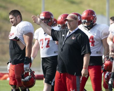 Eagles coach Aaron Best directs practice at Eastern Washington University on Aug. 7. (Jesse Tinsley / The Spokesman-Review)