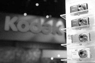 
New Kodak digital cameras are showcased at the Kodak booth at the 2007 International Consumer Electronics Show (CES) last month. Eastman Kodak Co. posted its first quarterly profit in more than two years as it enters the final stretch of a tough transformation into a digital photography and commercial printing company. 
 (Associated Press / The Spokesman-Review)