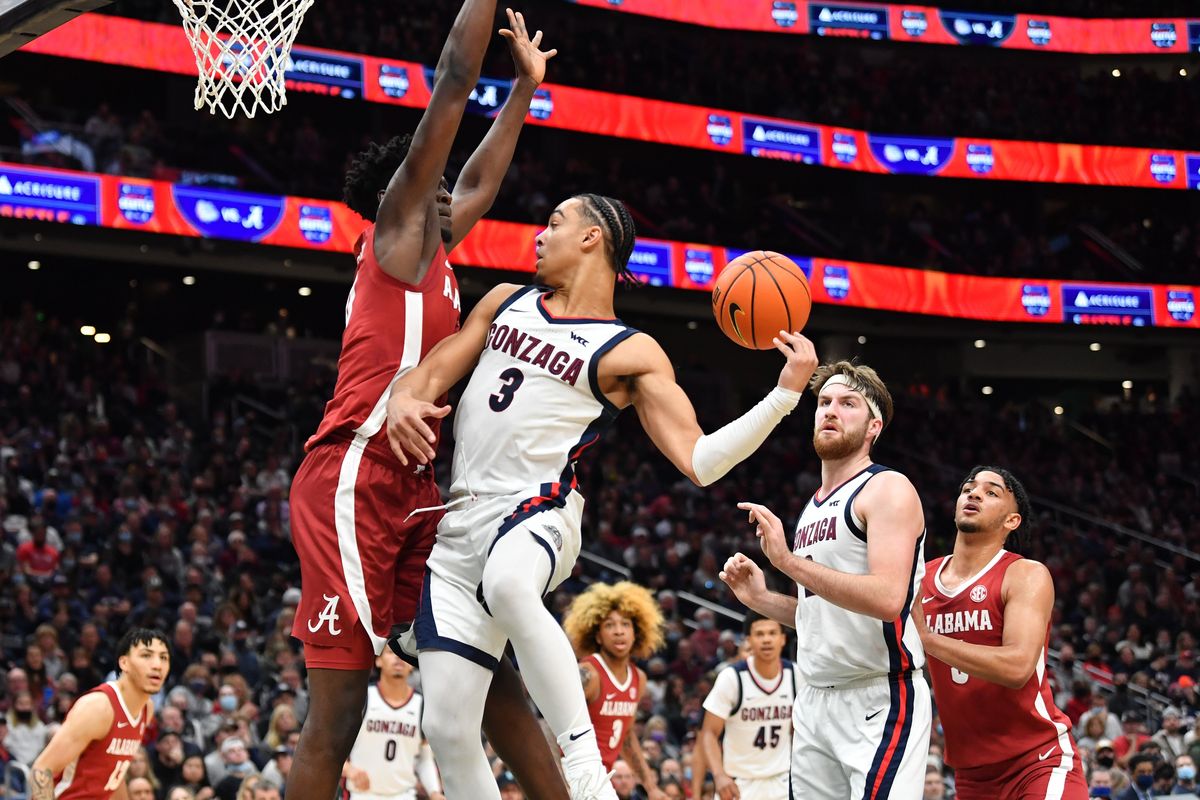 Gonzaga Bulldogs guard Andrew Nembhard (3) passes to forward Drew Timme (2) during the first half of a college basketball game against the Alabama Crimson Tide on Saturday, Dec 4, 2021, at Climate Pledge Arena in Seattle, Wash.  (Tyler Tjomsland/The Spokesman-Review)