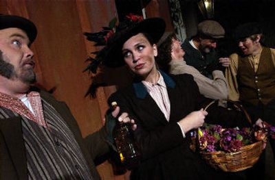 David Gigler plays Alfred P. Doolittle and Kendra Kimball plays Eliza Doolittle in a scene from Spokane Civic Theatre's production of 